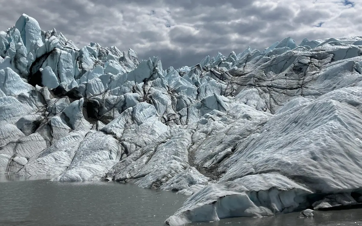 Guided group in ice cleats walking on the Matanuska Glacier in Alaska