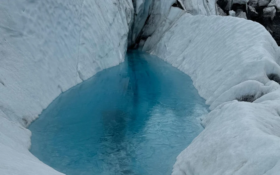 A guided group in ice cleats on the Matanuska Glacier in Alaska
